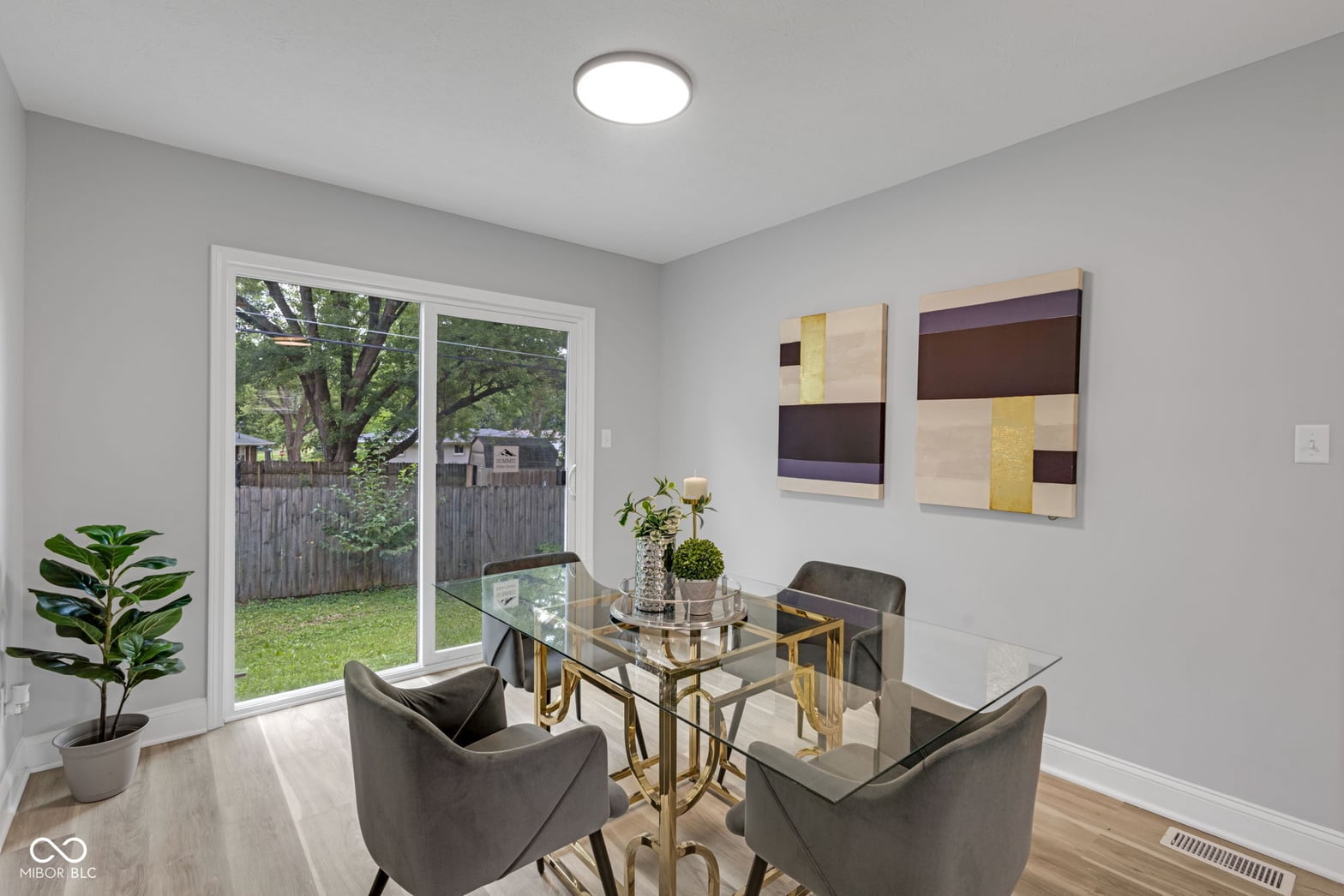 Bright contemporary dining with direct yard access