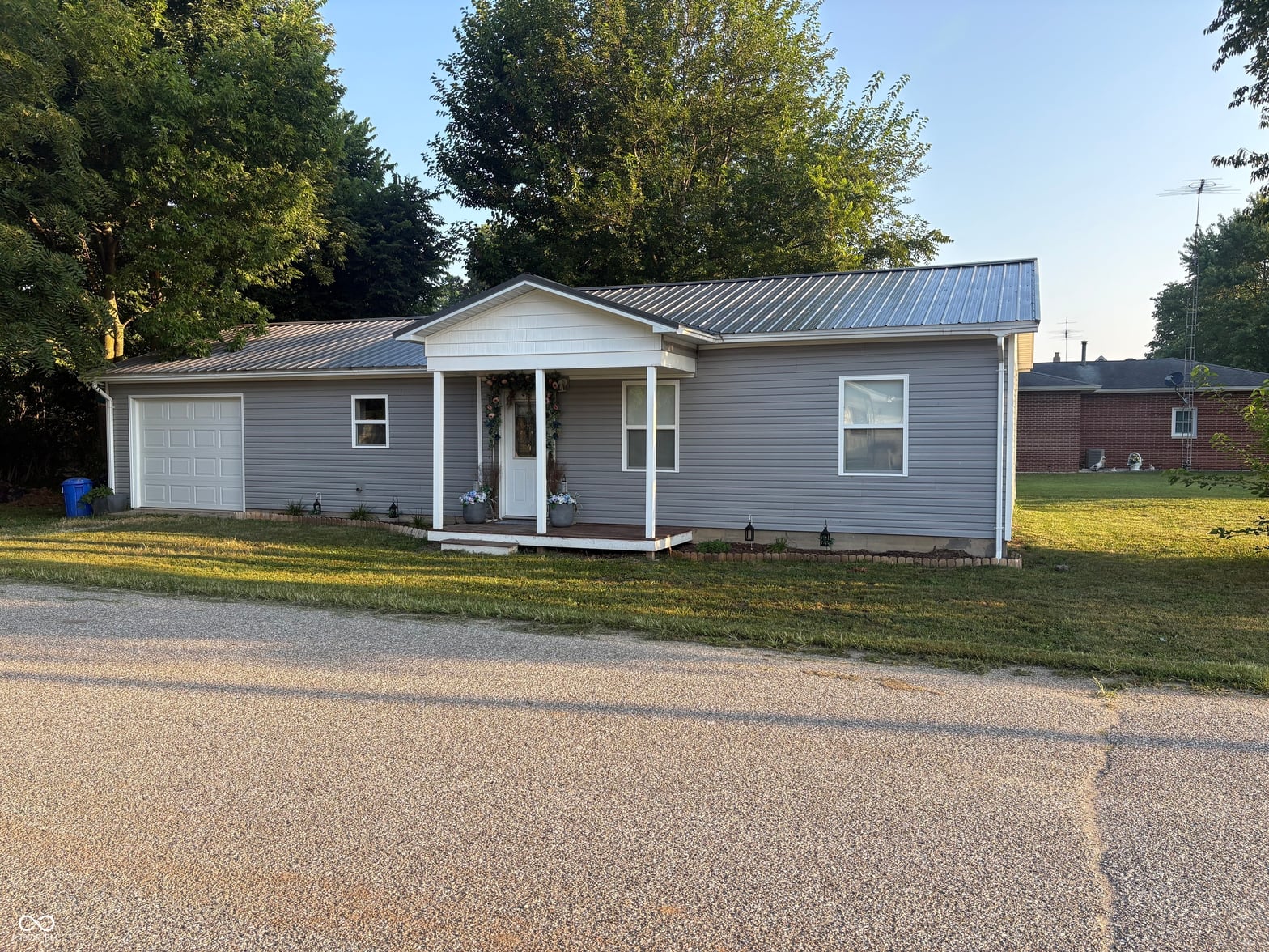 Front exterior at 402 W Maple Street, Cayuga, IN