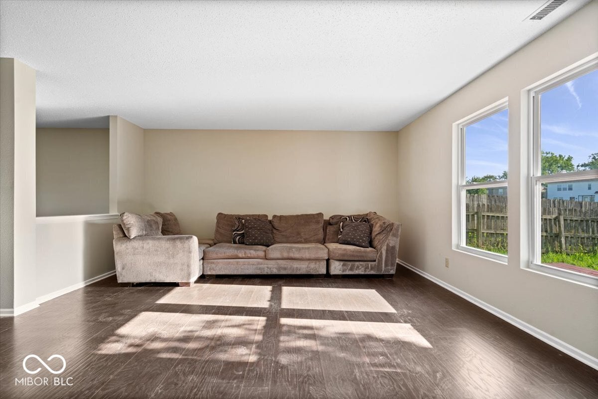 Bright, spacious living room with abundant natural light.