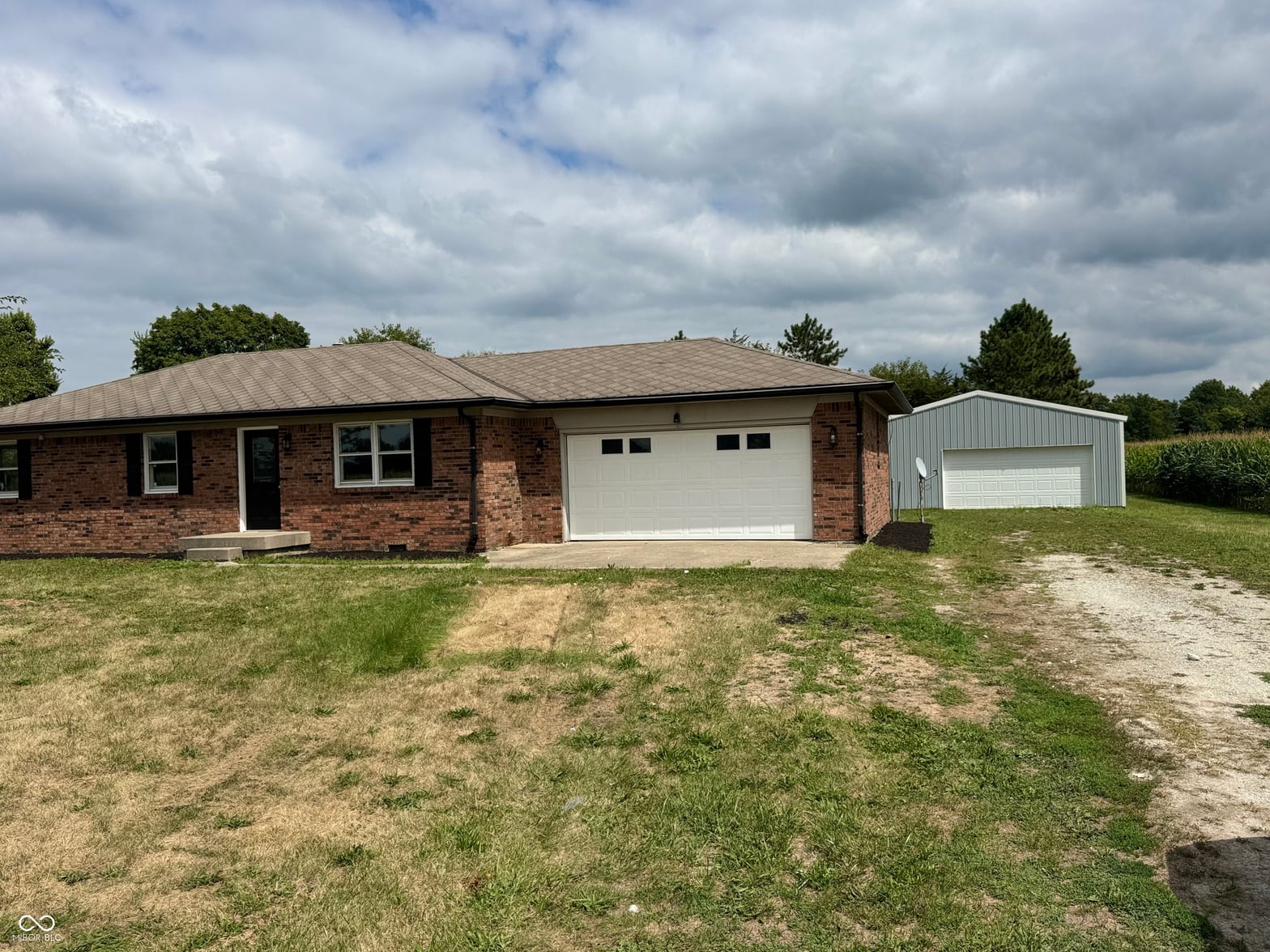 Front exterior at 23455 Lamong Road, Sheridan, IN