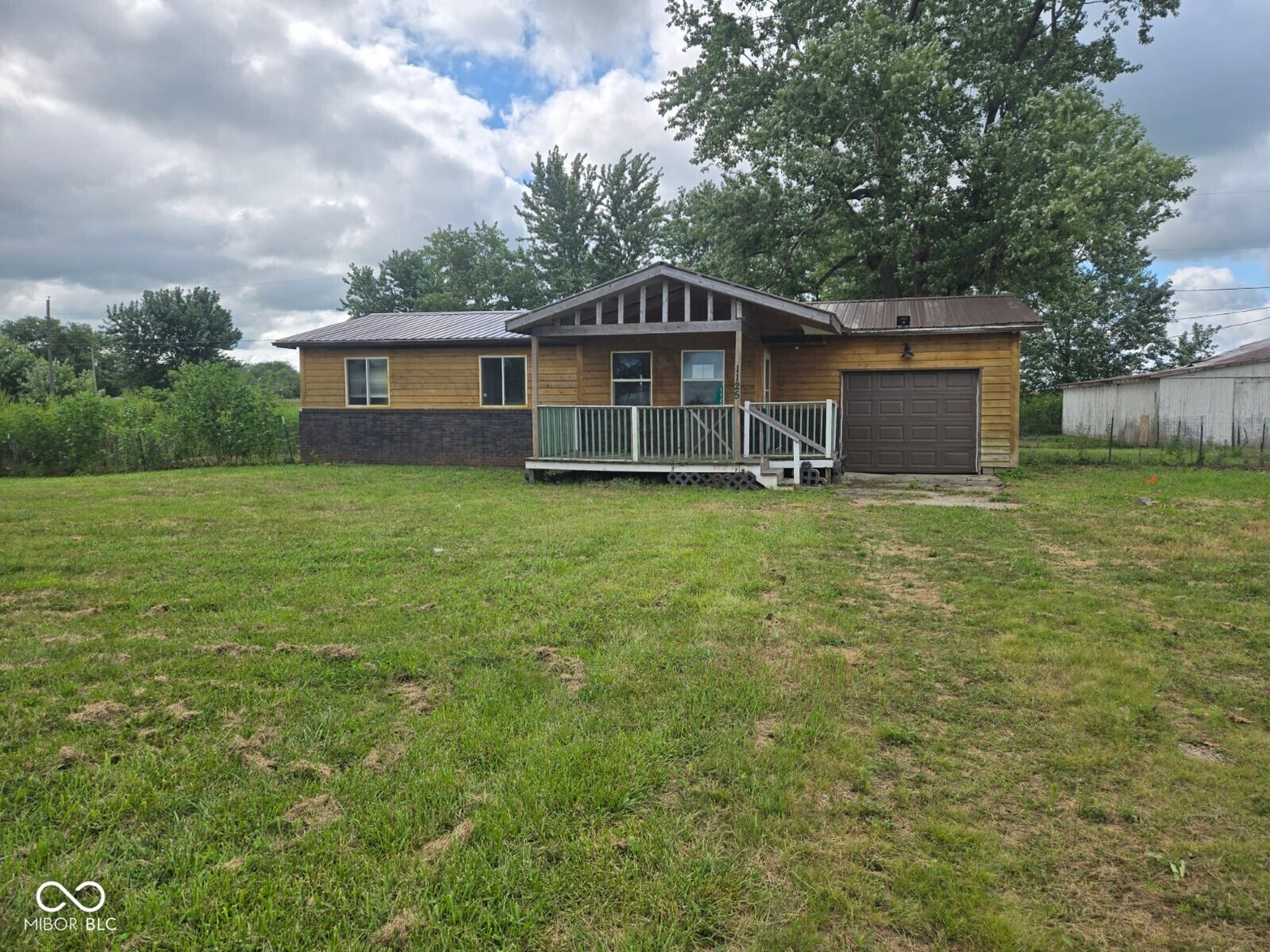 Front exterior at 1125 W Lake Hideaway Road, Kingman, IN