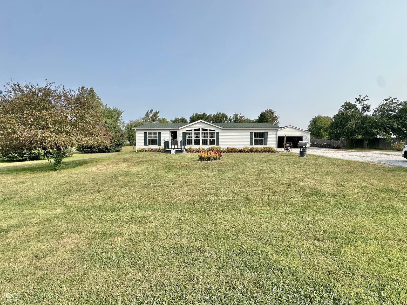 Front exterior at 10676 W Hickory Court, Quincy, IN