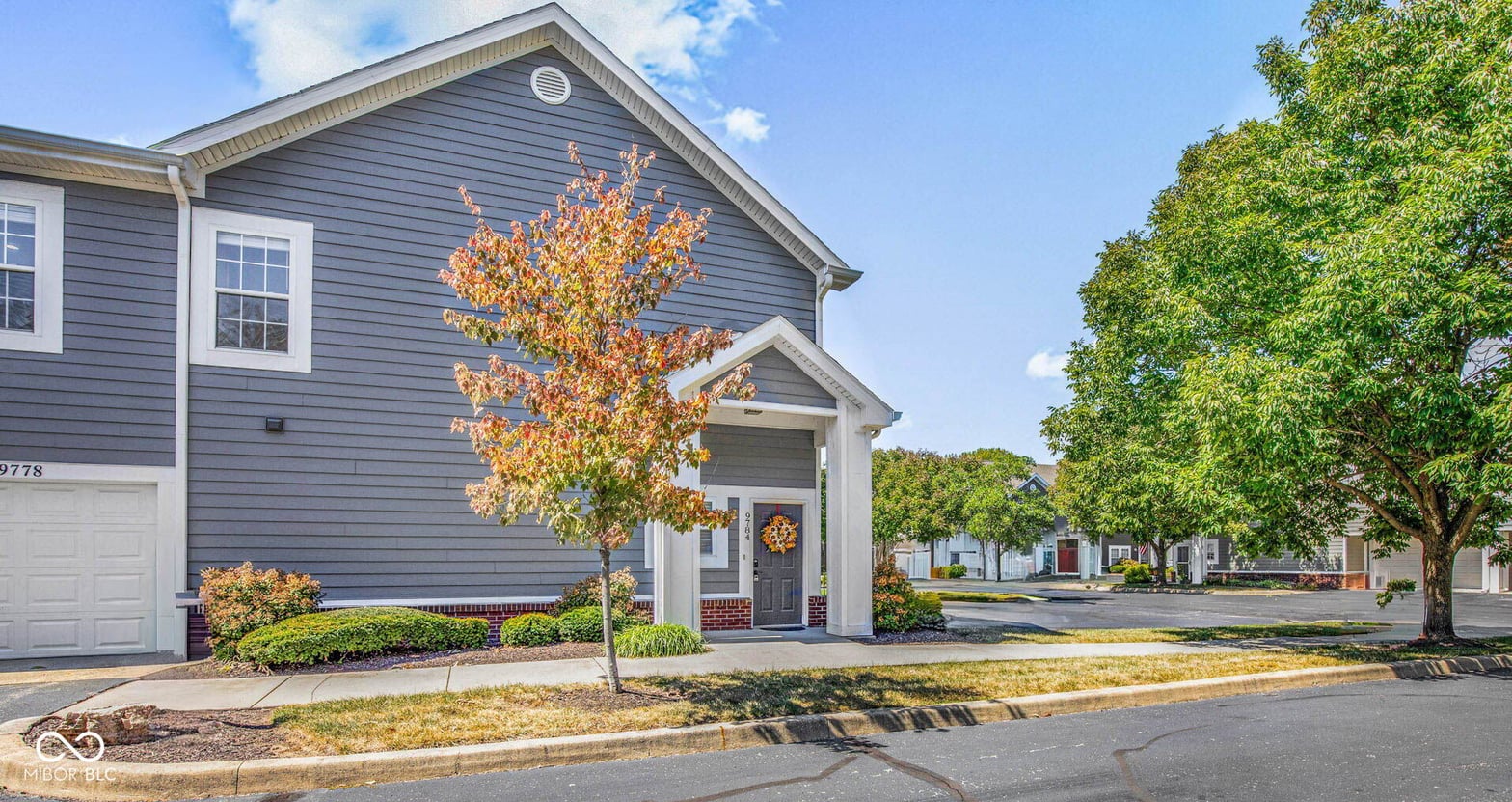 Front exterior at 9784 Herons Cove, Carmel, IN
