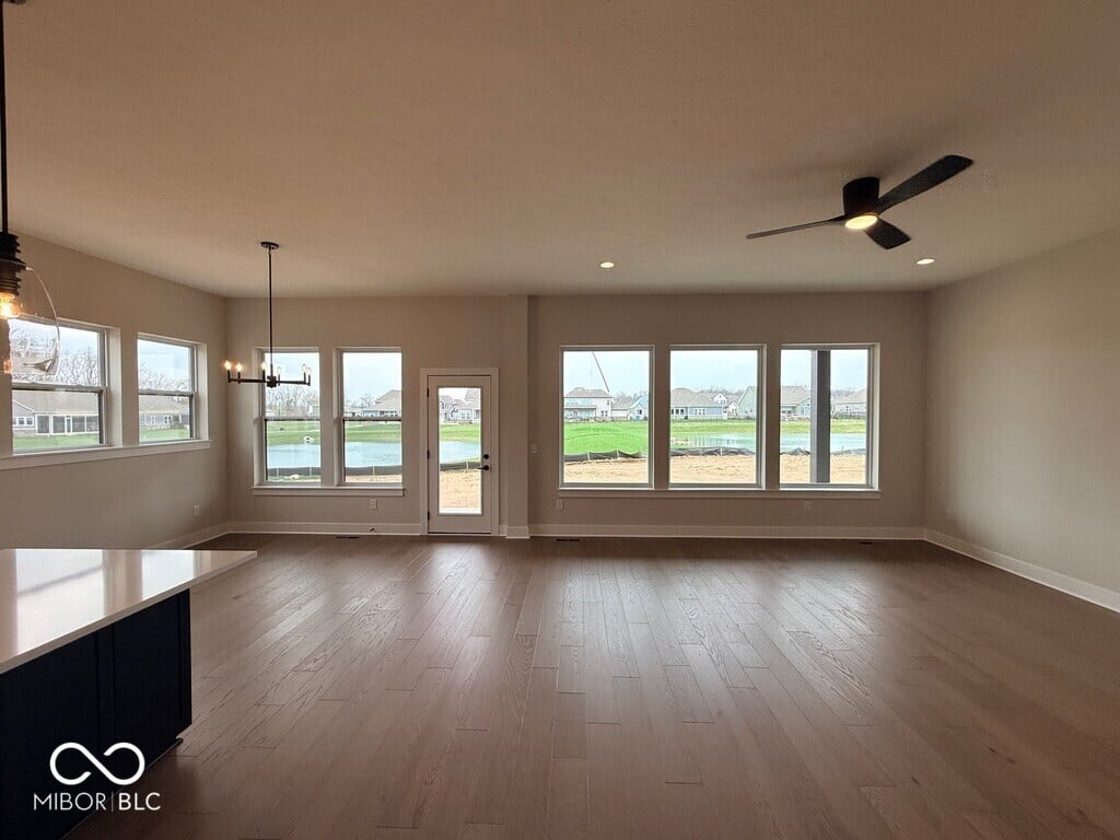 Bright open concept with panoramic water and countryside views.