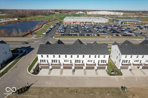 Front exterior at 408 Elite Street, Westfield, IN — New townhome community with modern design and amenities.