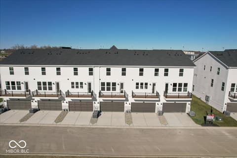 Front exterior at 408 Elite Street, Westfield, IN — Brand new townhome community with modern construction.