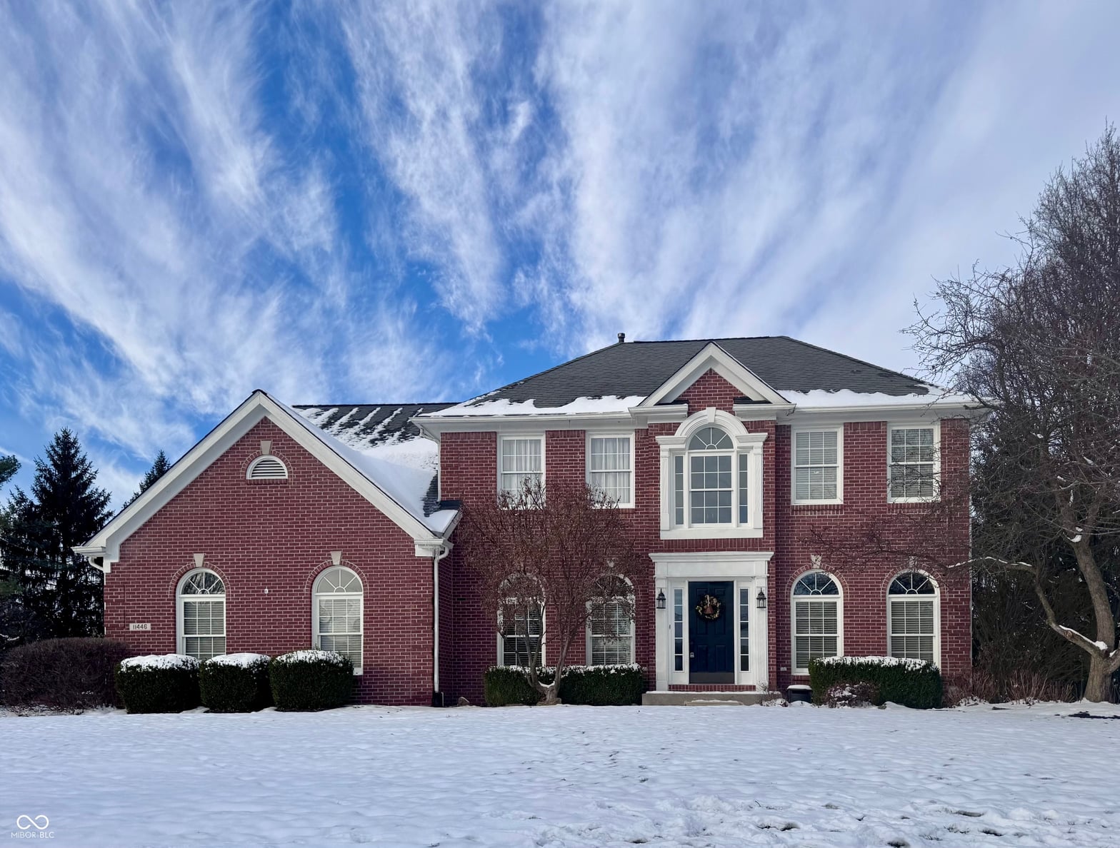 Front exterior at 11446 Sutton Place Drive W, Carmel, IN