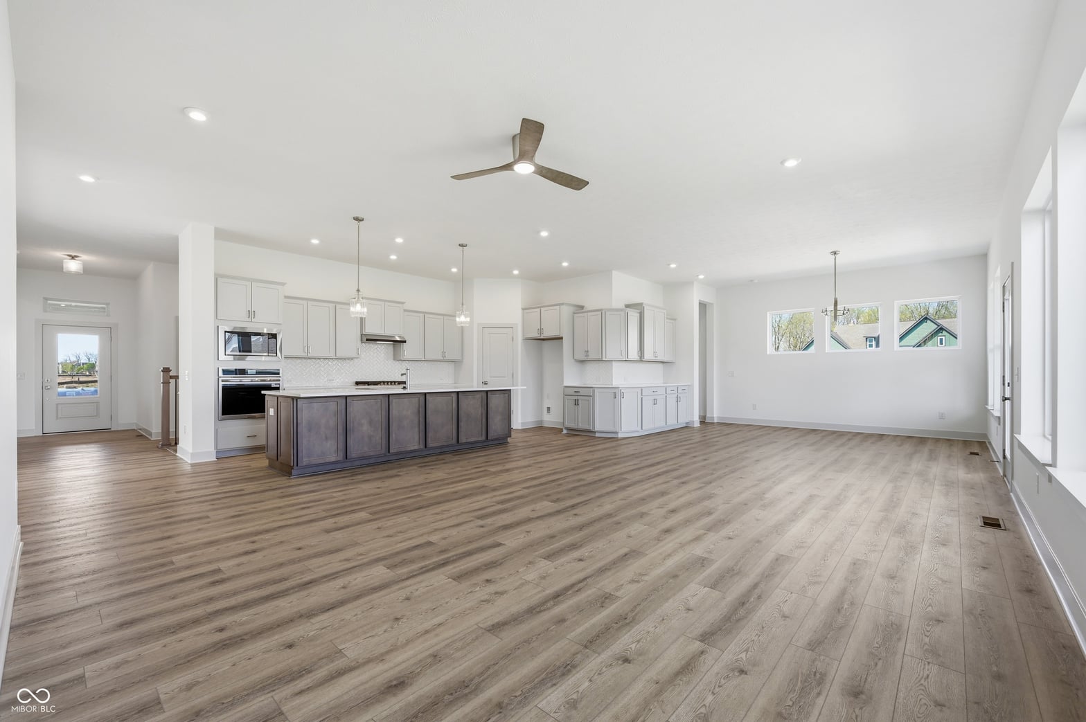 Spacious modern kitchen with large island and open layout.