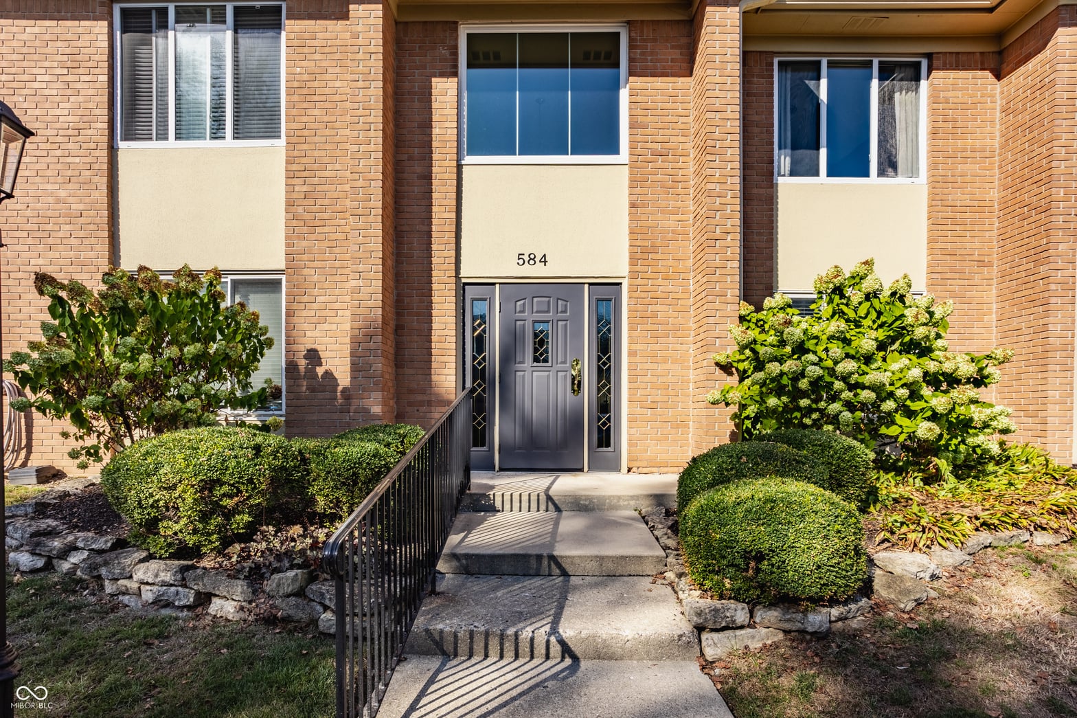 Front exterior at 584 E Hunters Drive, Carmel, IN