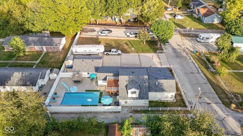 Aerial view at 140 Wiley Street, Cicero, IN — Aerial view showing in-ground pool and updated home.