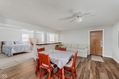 Primary bedroom at 140 Wiley Street, Cicero, IN — Spacious primary suite with dining and sitting areas.