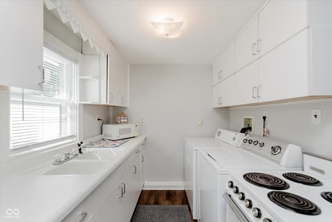 Laundry room at 140 Wiley Street, Cicero, IN