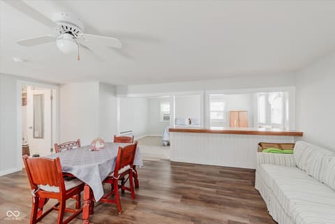 Family room at 140 Wiley Street, Cicero, IN — Bright open concept family room with hardwood floors.