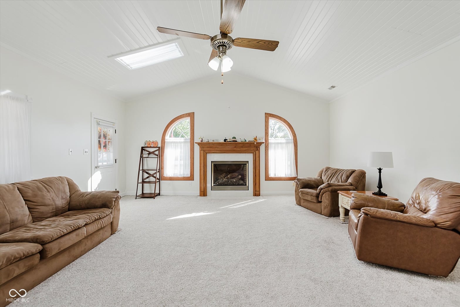 Family room at 140 Wiley Street, Cicero, IN — Spacious family room with vaulted ceilings and fireplace.