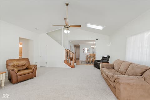 Family room at 140 Wiley Street, Cicero, IN — Spacious vaulted family room with abundant natural light.