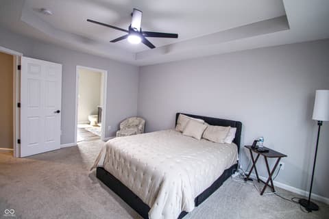 Primary bedroom at 17521 Gruner Way, Westfield, IN — Spacious primary suite with ensuite and modern finishes.