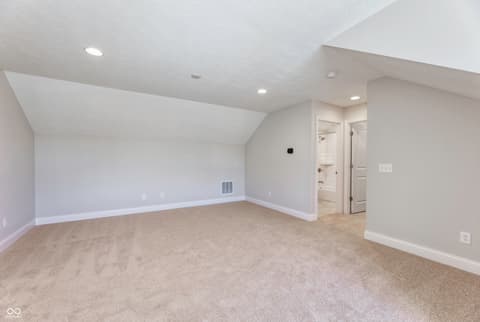 Bonus room at 16098 Quarter Pole Lane, Westfield, IN — Bright bonus room with vaulted ceilings and ensuite access.