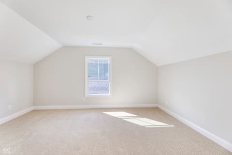 Bonus room at 16098 Quarter Pole Lane, Westfield, IN — Bright bonus room with vaulted ceilings and natural light.