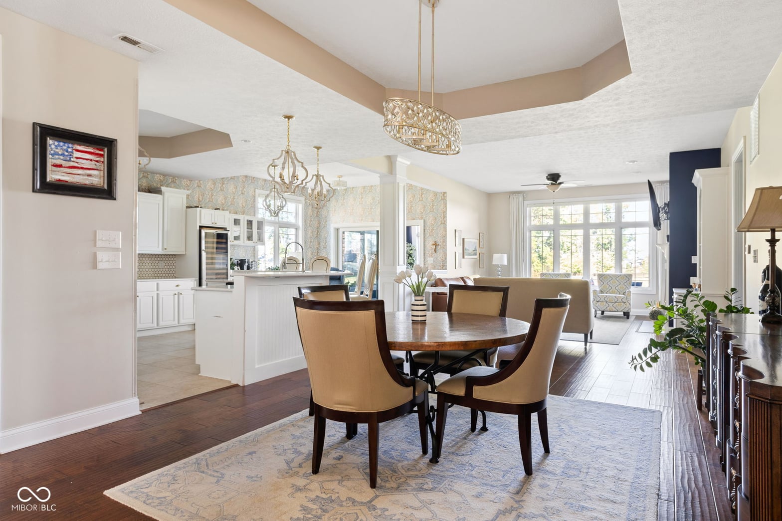 Open-concept dining flows seamlessly into updated kitchen.