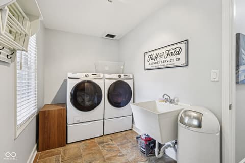 Laundry room at 13514 Dallas Lane, Carmel, IN