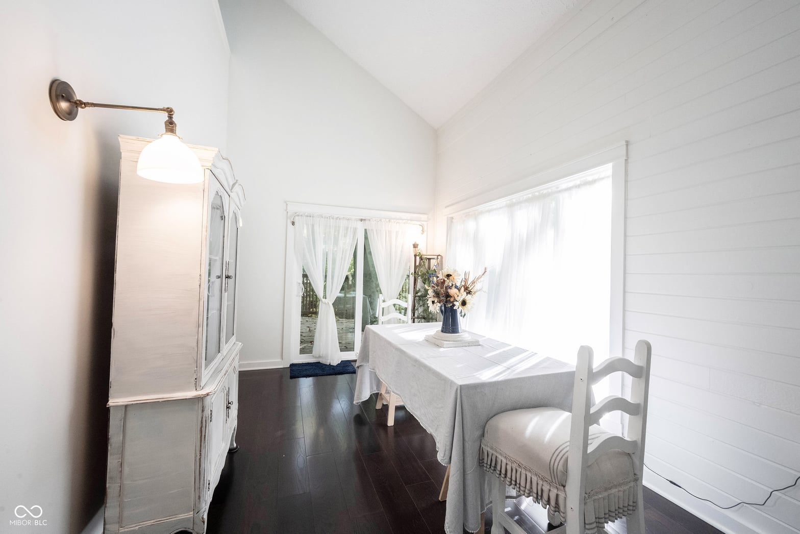 Bright farmhouse primary bath with vintage charm and modern updates.