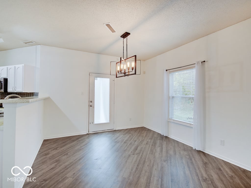 Bright, open dining area with modern fixtures and finishes.