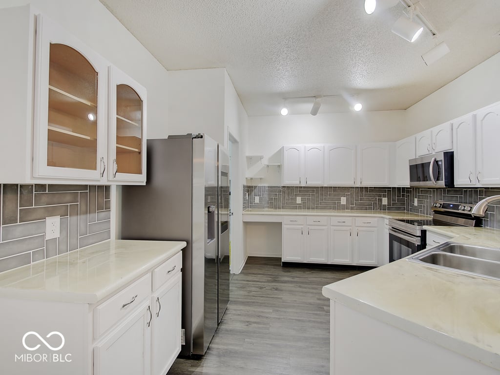 Modern renovated kitchen with premium finishes and layout.