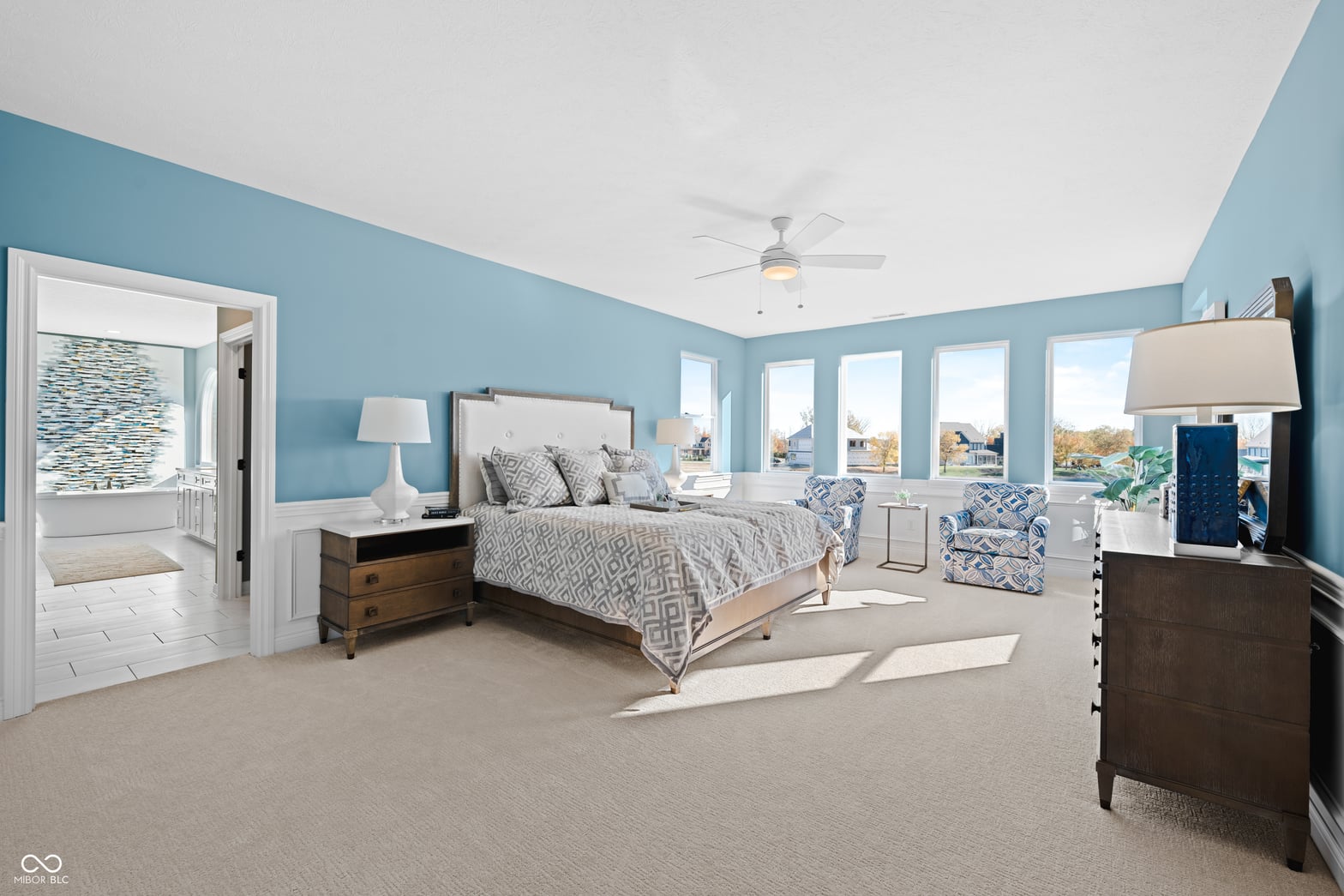 Primary bedroom at 4301 Stone Lake Drive, Zionsville, IN — Bright, spacious primary suite with ensuite bath.