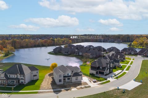 Aerial view at 4301 Stone Lake Drive, Zionsville, IN — Stunning waterfront community with lake-view homes.