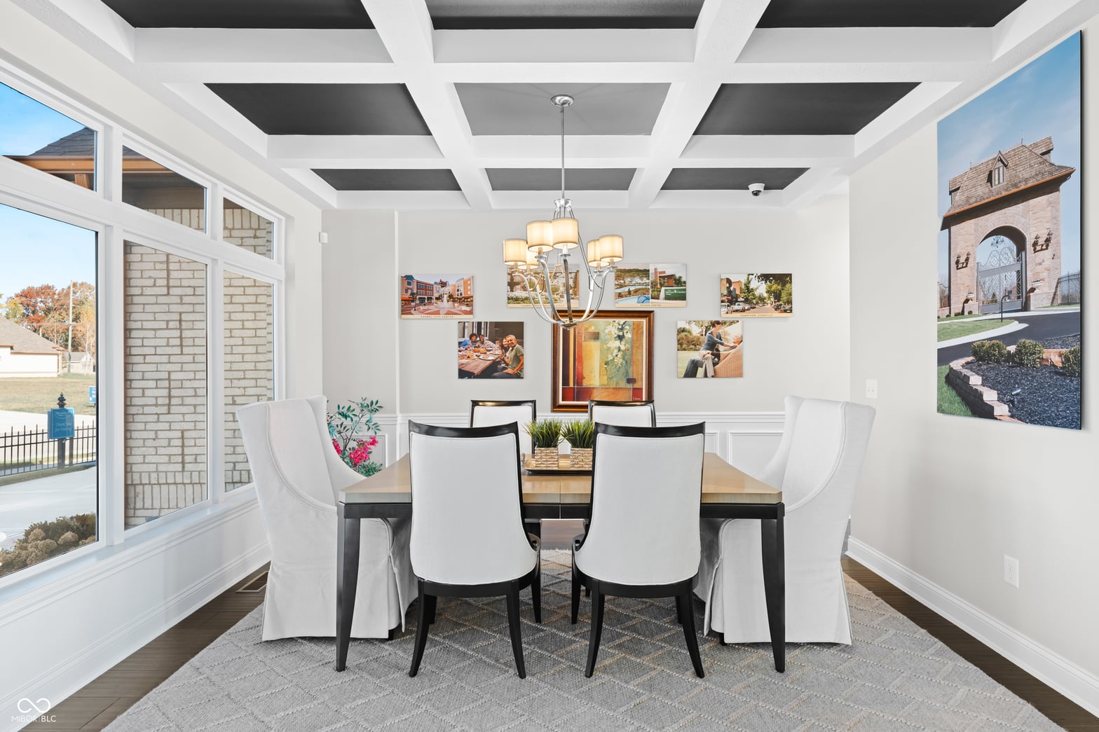 Dining room at 4301 Stone Lake Drive, Zionsville, IN — Bright dining room with coffered ceiling and natural light.