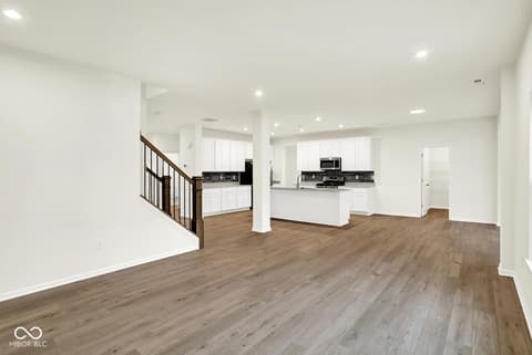 Kitchen at 3746 Thomas Jefferson Court, Westfield, IN — Modern kitchen with island and open floor plan layout