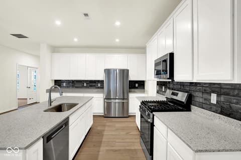 Kitchen at 3746 Thomas Jefferson Court, Westfield, IN — Stunning modern kitchen with premium finishes and layout.