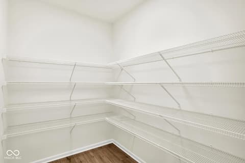 Pantry at 3746 Thomas Jefferson Court, Westfield, IN — Spacious pantry with extensive wire shelving storage.