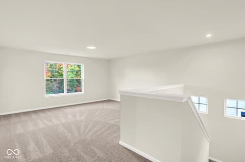Bonus room at 3746 Thomas Jefferson Court, Westfield, IN — Bright bonus room with vaulted ceiling and natural light.