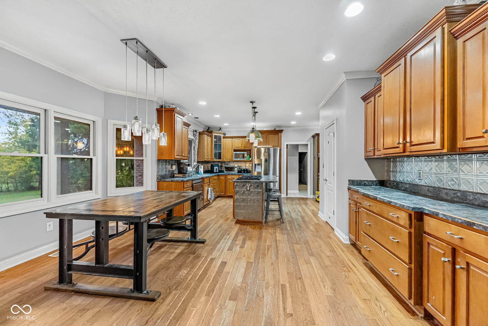 Spacious updated kitchen with island and abundant natural light.