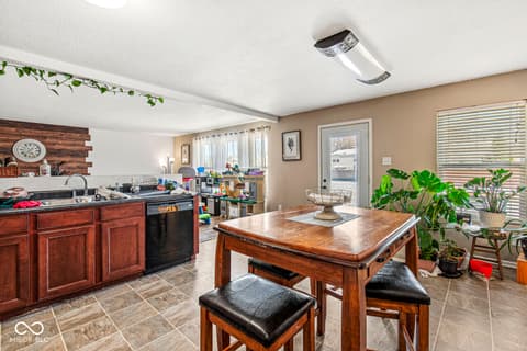 Kitchen at 1225 Maple Trace Way, Sheridan, IN — Spacious kitchen with wood island and natural light.