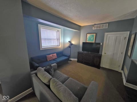 Living room at 230 E 9th Street, Indianapolis, IN