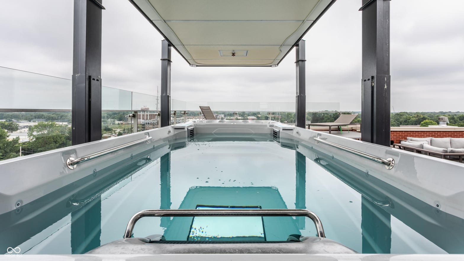 Luxurious rooftop infinity pool with stunning city panoramas.