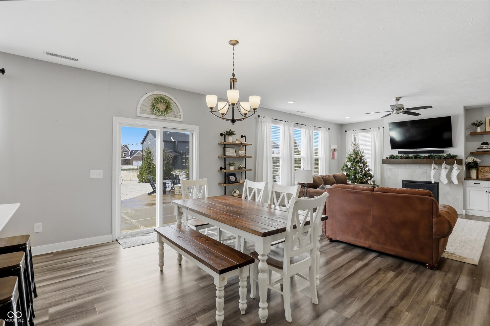Bright open-concept dining area with patio access.