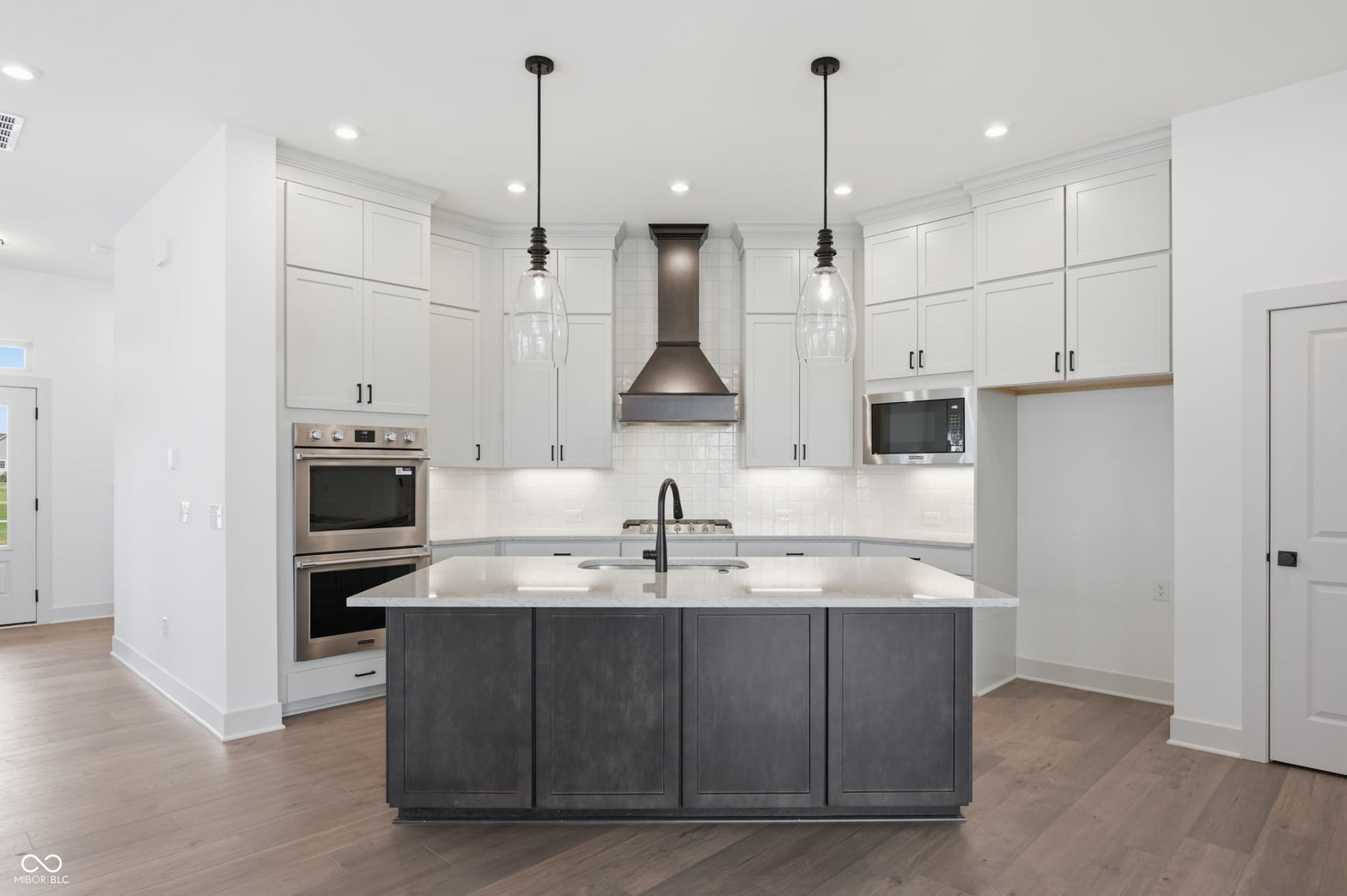 Stunning modern kitchen with contrasting island and premium finishes.