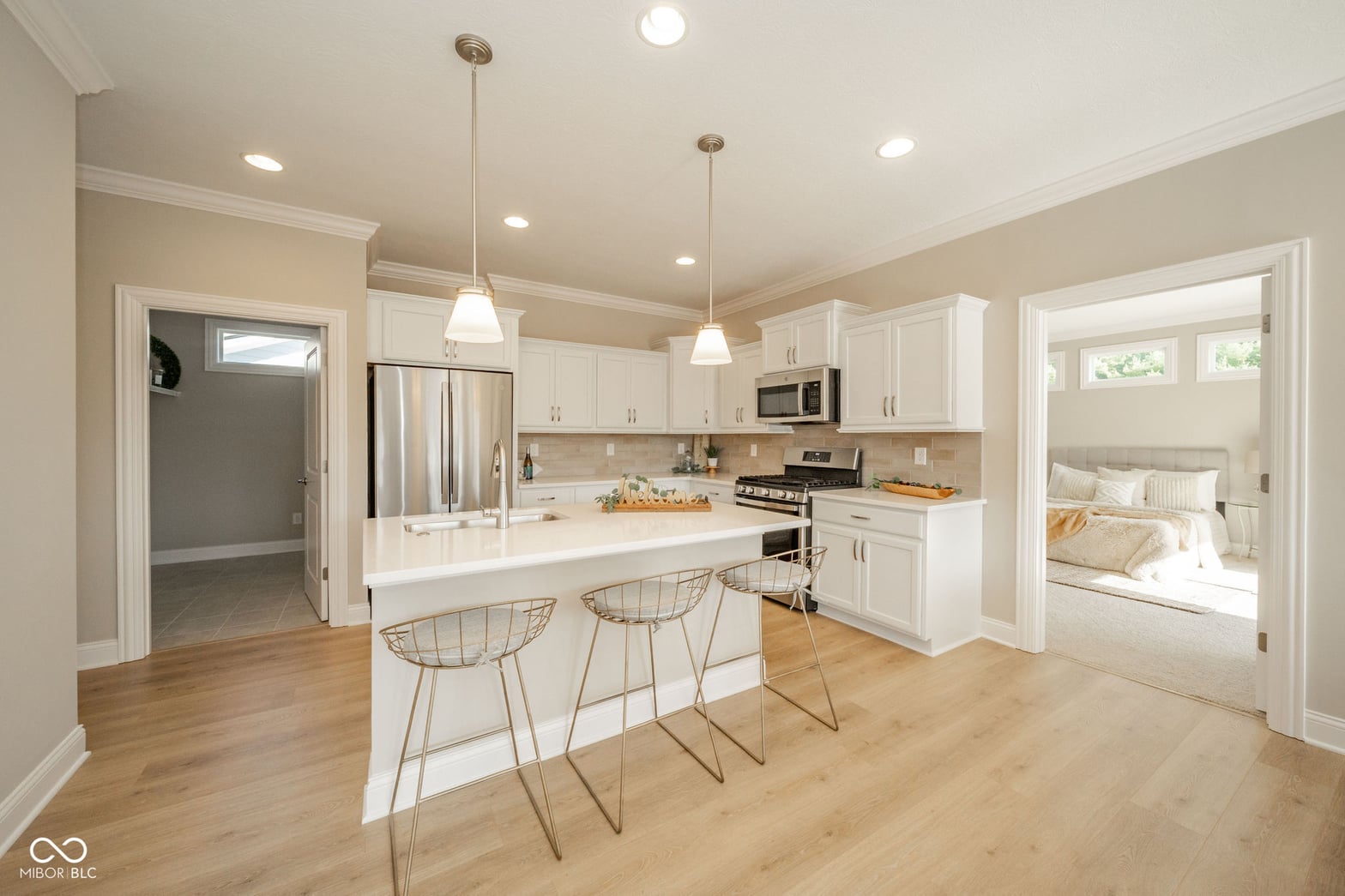 Bright, modern kitchen with island and premium finishes.