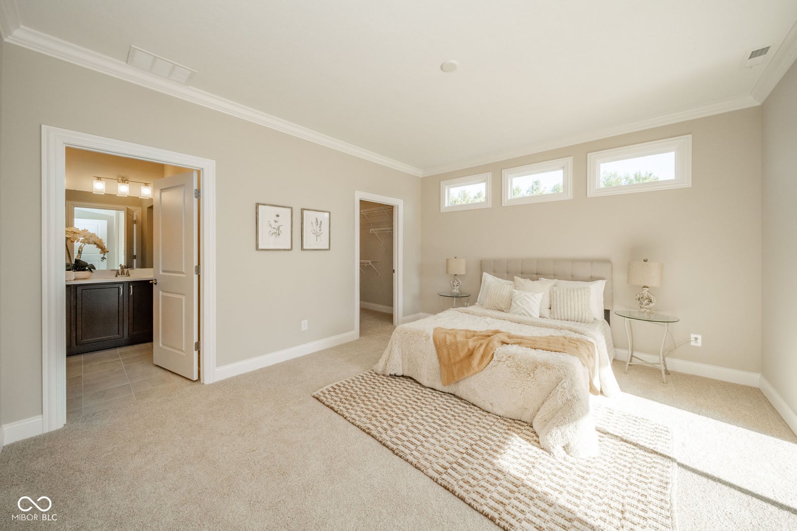 Spacious primary suite with ensuite bath and natural light.