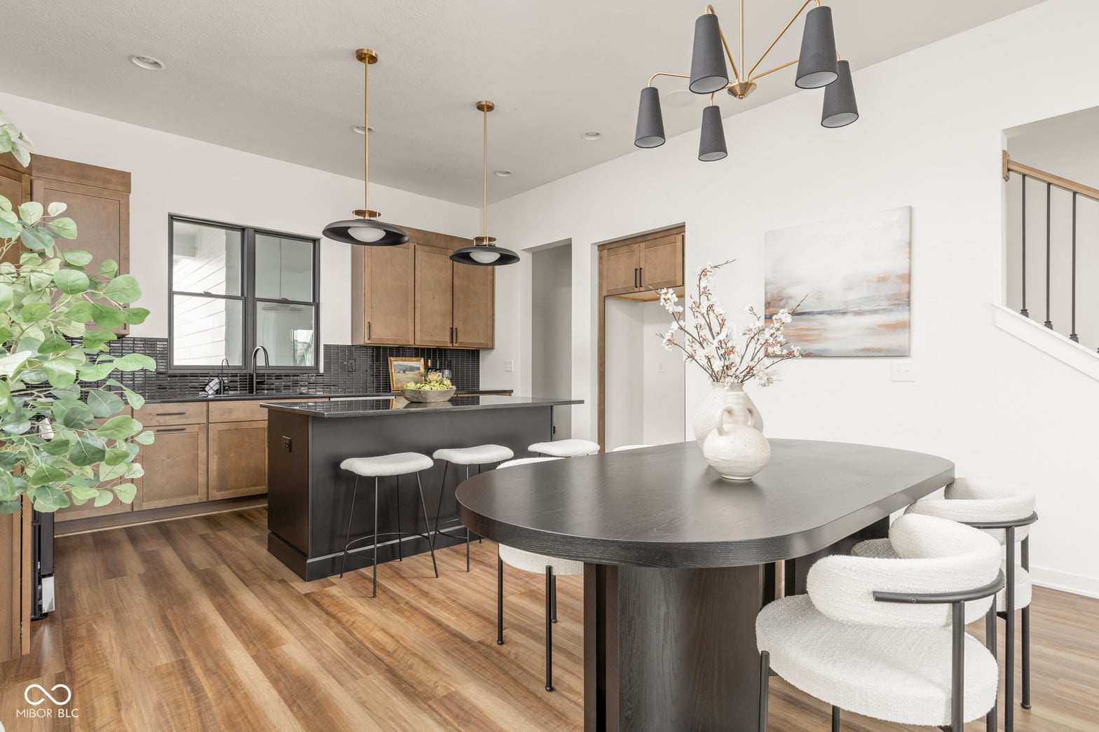 Modern renovated kitchen with premium finishes and island seating.