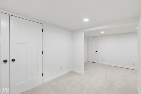 Bonus room at 4991 E Main Street, Carmel, IN — Bright, spacious bonus room with ample closet storage.