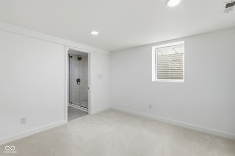 Primary bathroom at 4991 E Main Street, Carmel, IN — Spacious primary bath with luxurious walk-in shower.