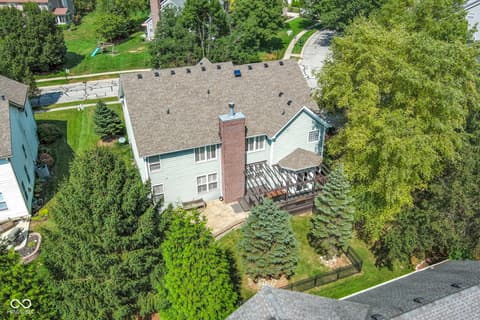 Aerial view at 14825 Latitude Way, Fishers, IN — Well-maintained home with mature landscaping and privacy.