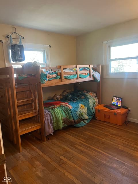 Bedroom at 6160 E 116th Street, Fishers, IN — Spacious bedroom with built-in bunk beds and storage.