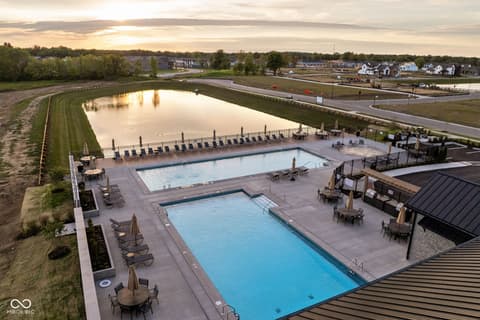 Pool at 16956 Tractive Drive, Westfield, IN — Resort-style community pools with scenic pond views.