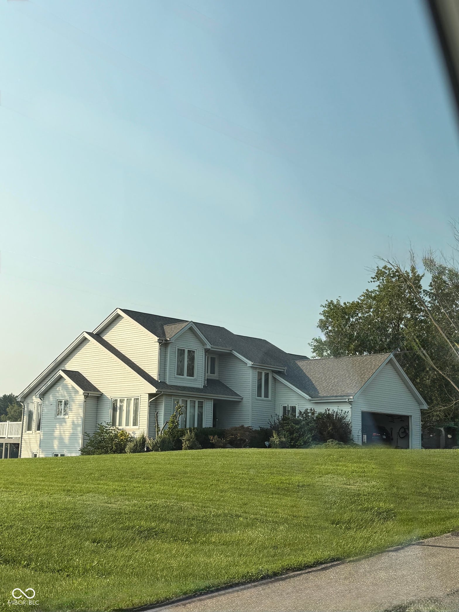 Front exterior at 15782 E Lake Shore Drive S, Hope, IN