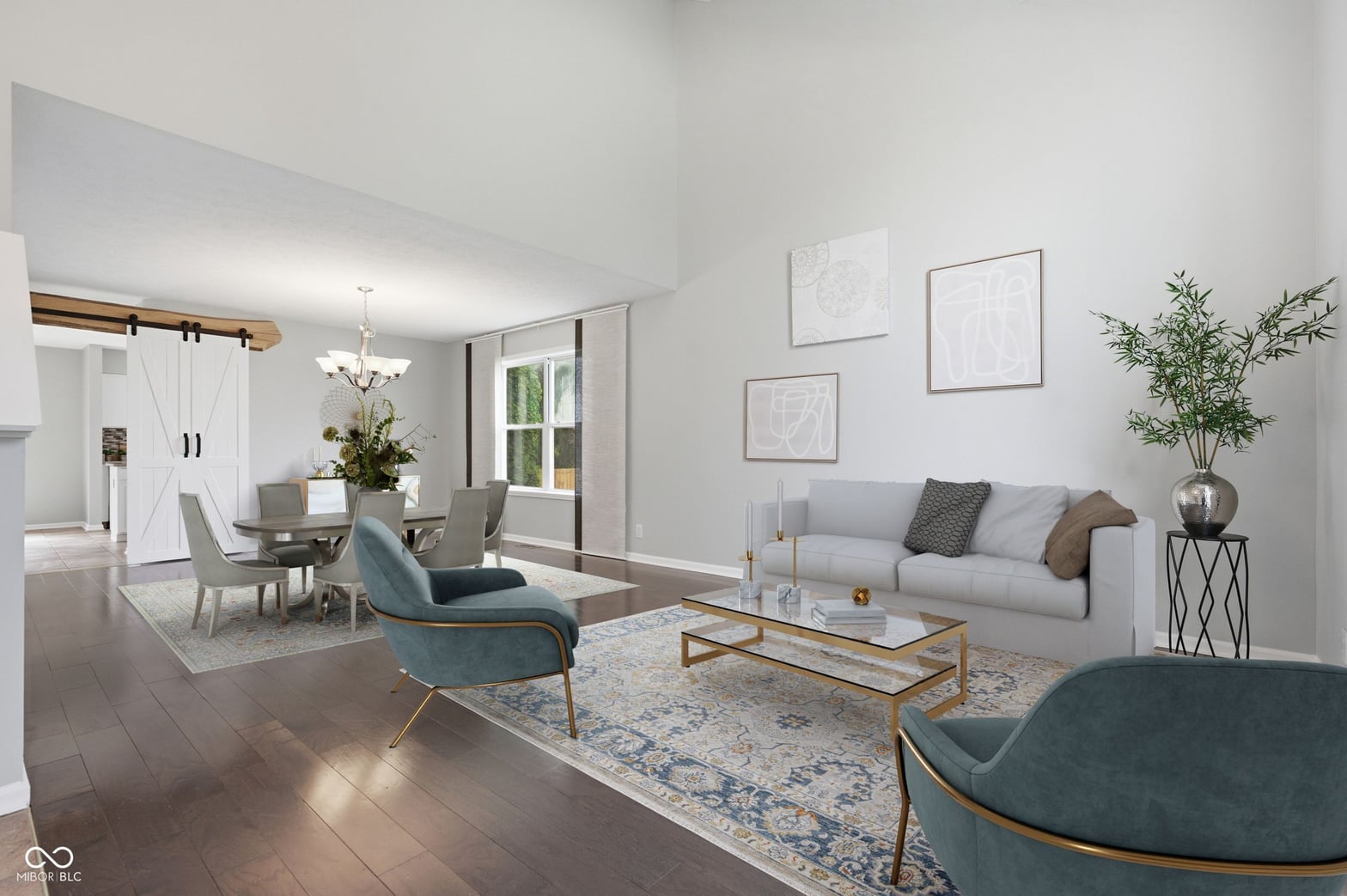 Bright modern living room with hardwood floors and high ceilings.
